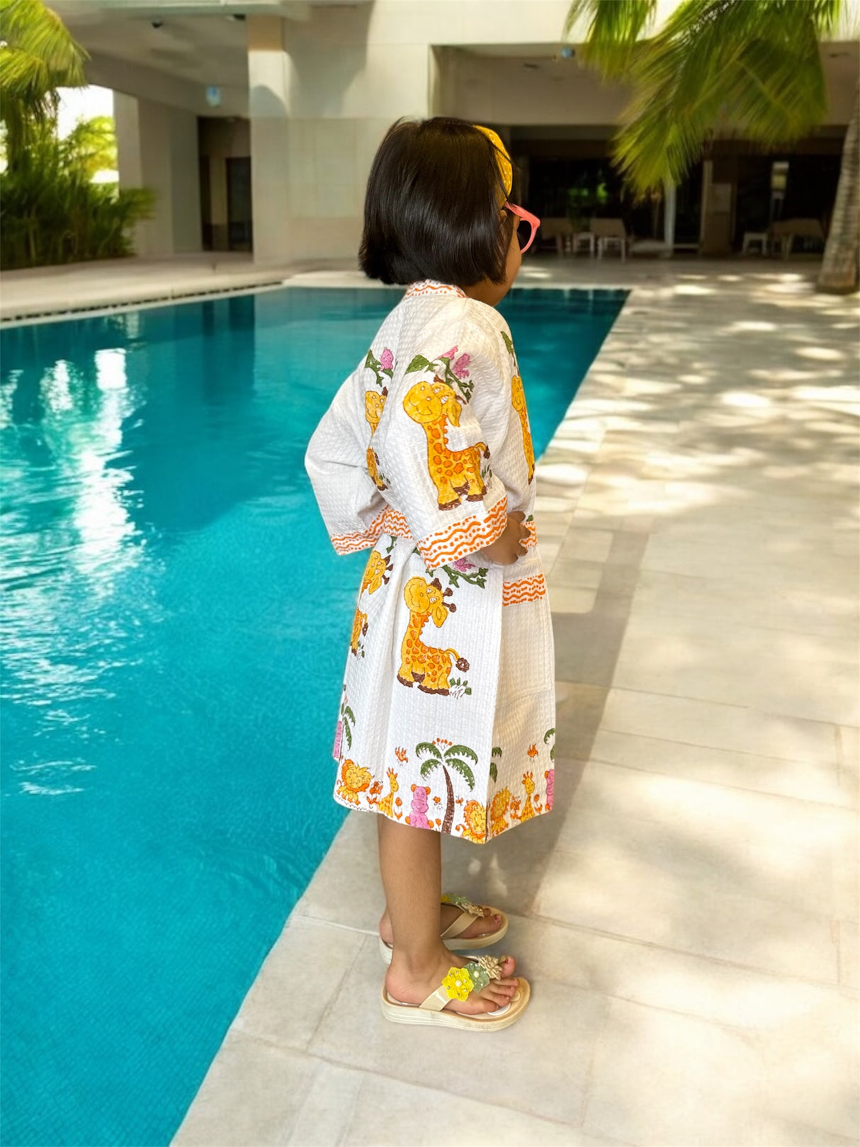 adorable kids bathrobe with cute giraffe print for resale worldwide retail stores and small businesses