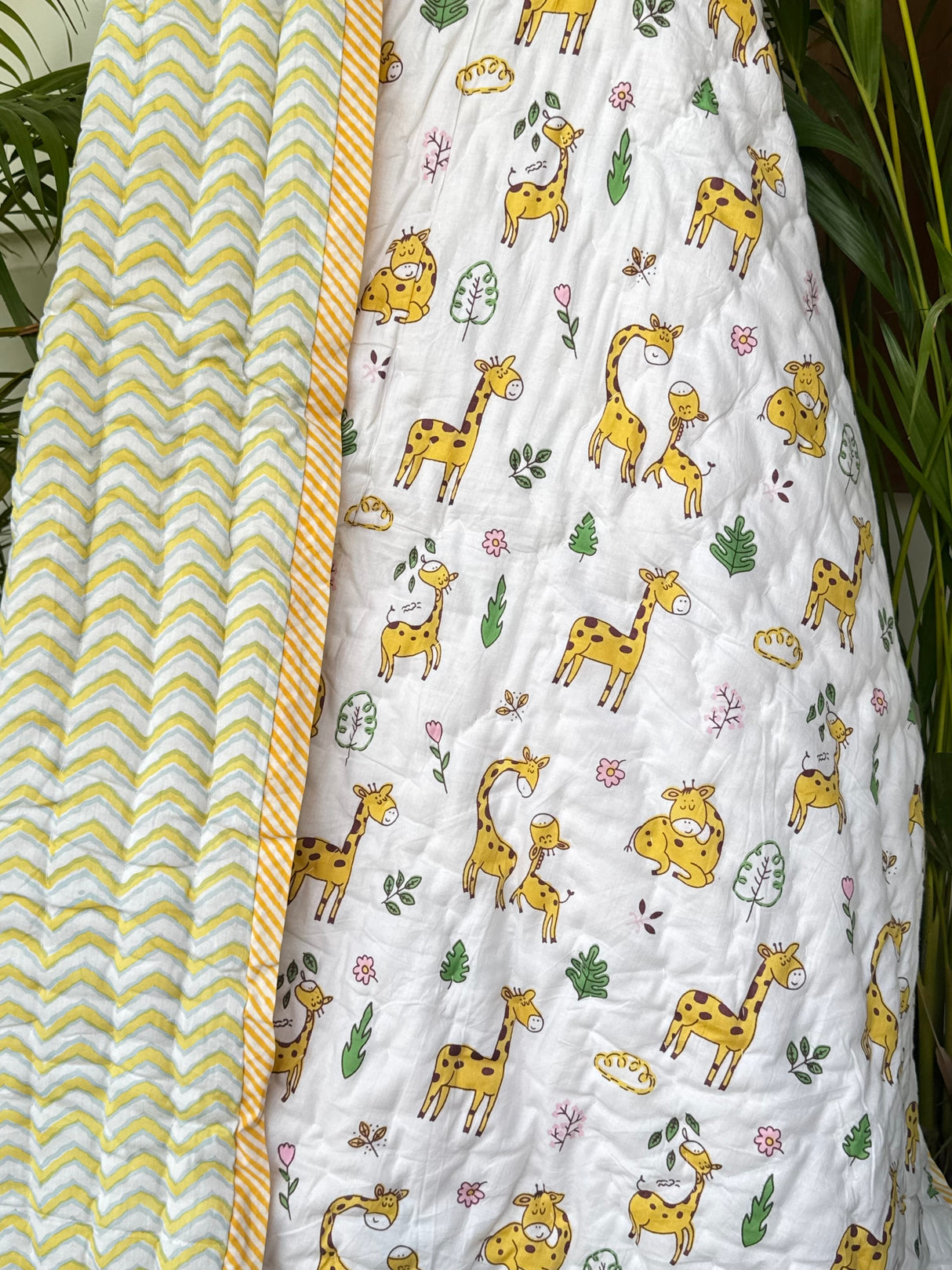 soft breathable baby quilt with cute giraffe print in yellow cotton fabric loved by parents in Canada and UK