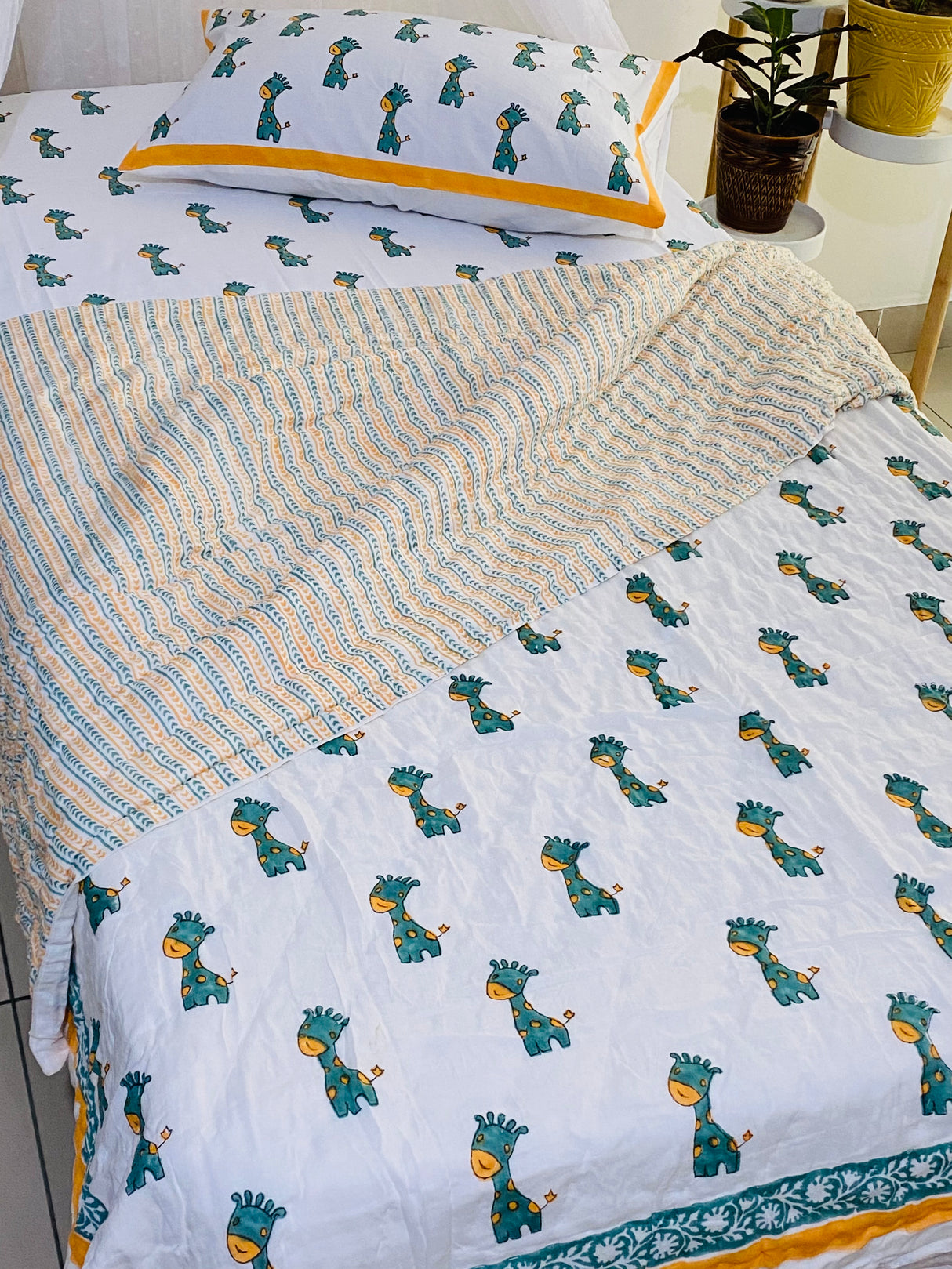 lightweight summer baby dohar with giraffe motif in block print ideal for retail orders in Canada and UK