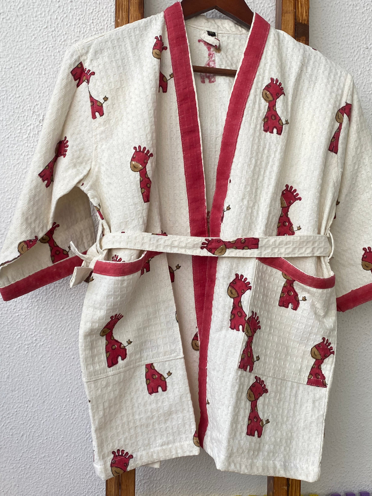 cute animal print kids bathrobe made of waffle cotton with embroidered name for birthday parties baby showers and bulk gifting