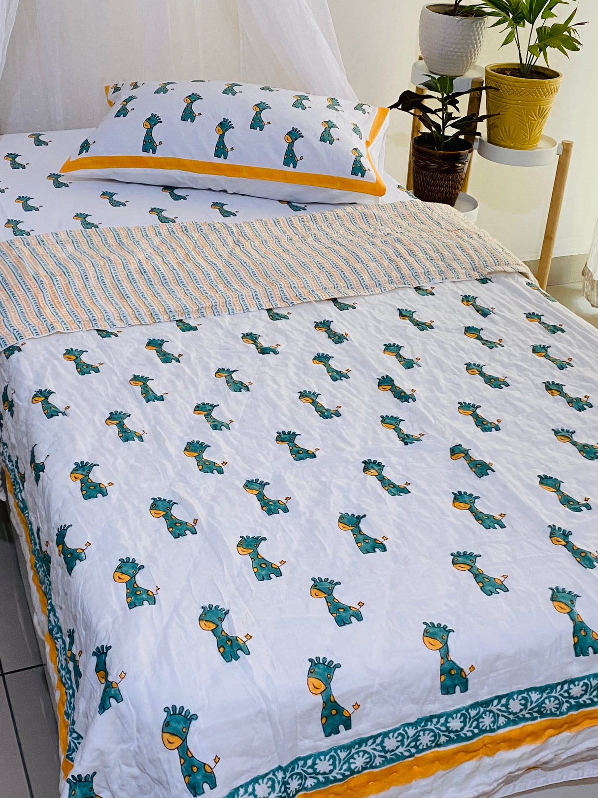 pure cotton baby quilt featuring green and yellow giraffes in traditional Indian block print ideal for UK and South Africa
