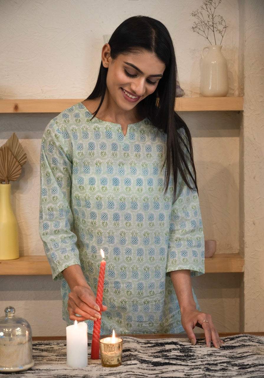 green-pineapple-cotton-pajama-folded-view