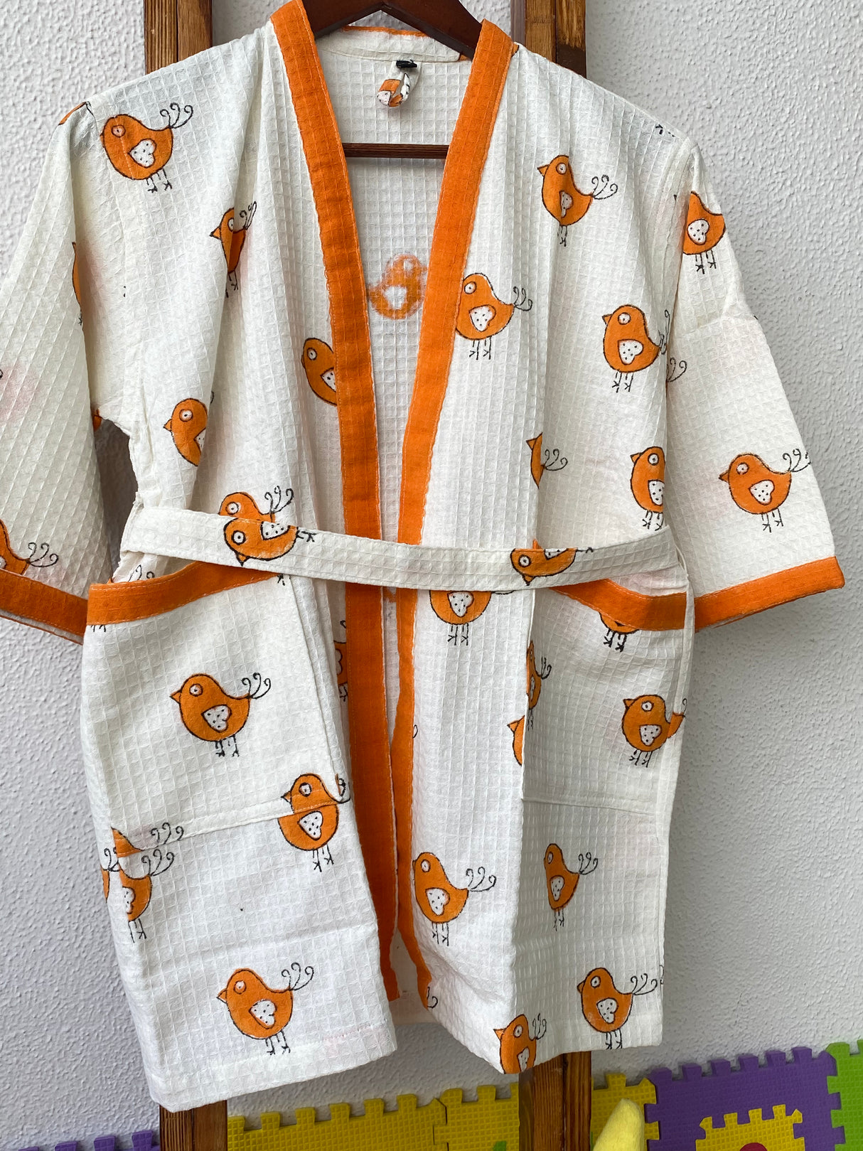 best selling handblock cotton kids bathrobe with name embroidery ideal for return gifts and exported in bulk outside India for playdates and parties