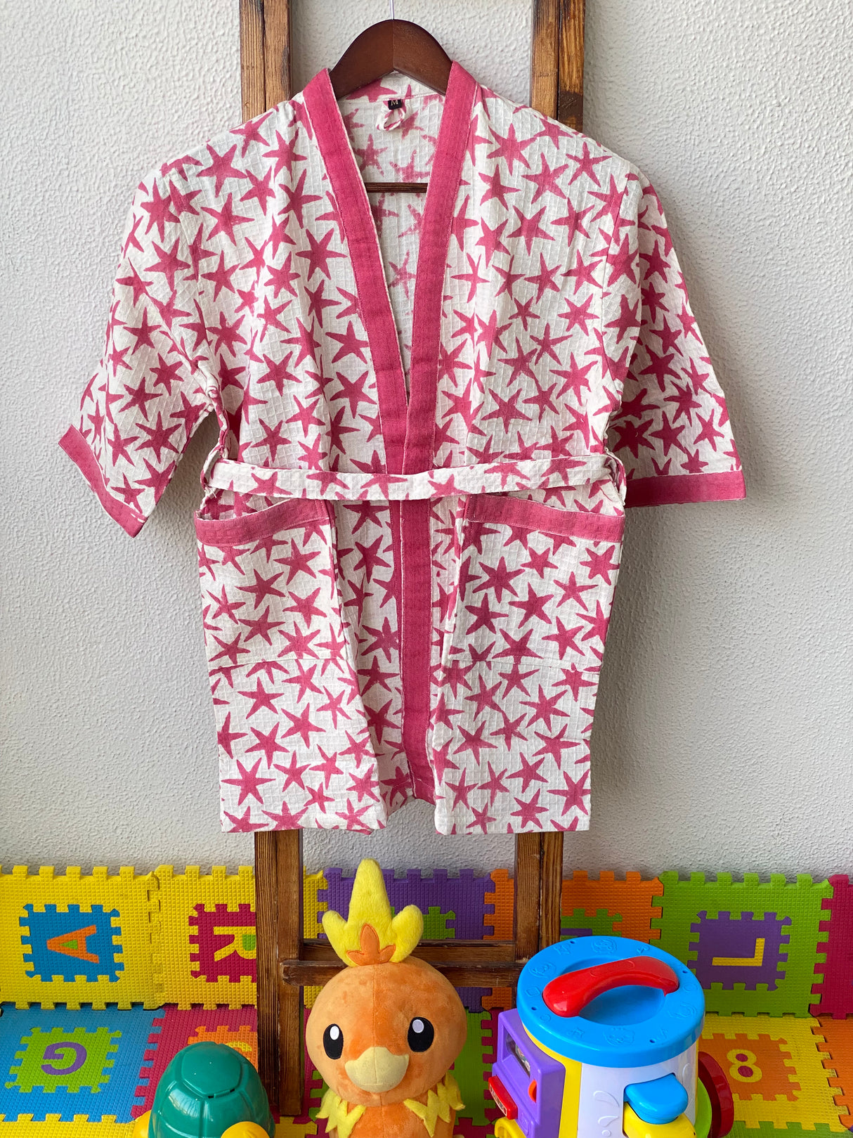 girls waffle cotton bathrobe with pink stars print customized with embroidered name ideal for birthday gifts and bulk resellers
