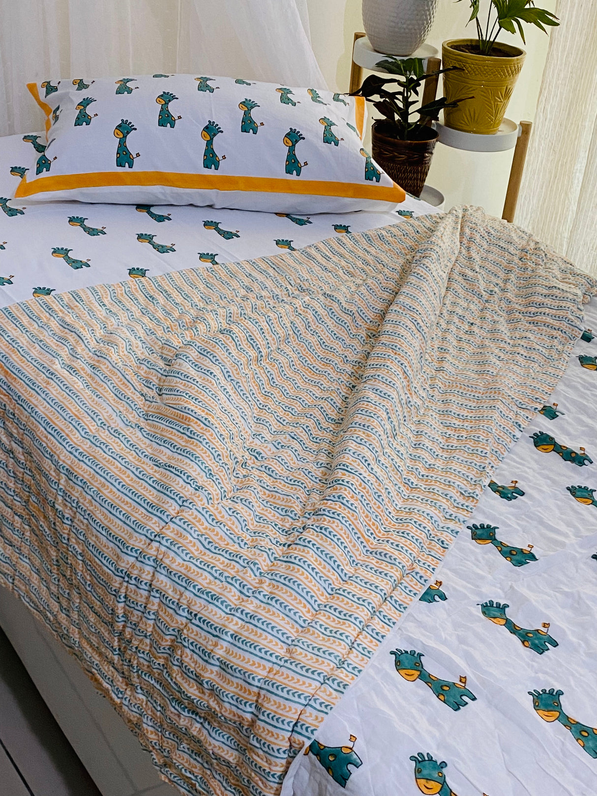 sustainable hand block printed quilt for kids in giraffe theme perfect for return favors and wholesale in UK and New Zealand