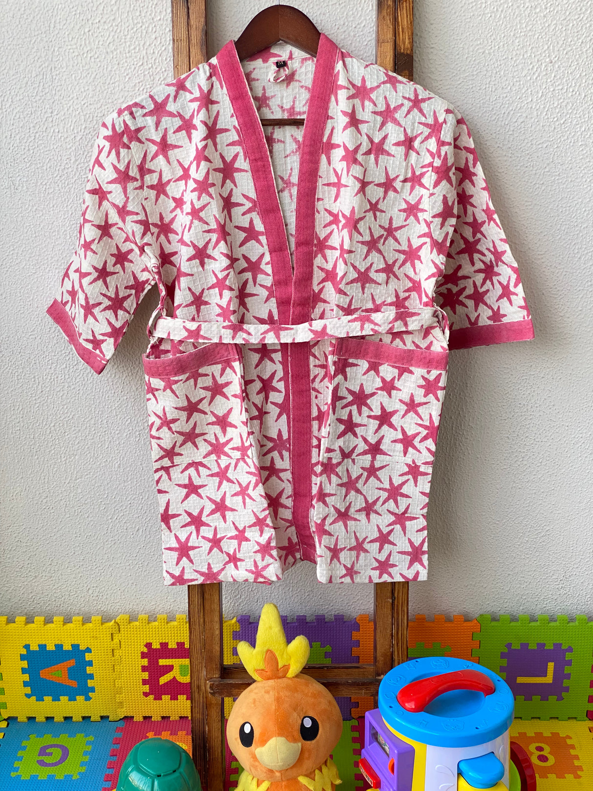 personalized pink stars bathrobe for girls in waffle cotton fabric perfect for playdates birthday parties and international gifting