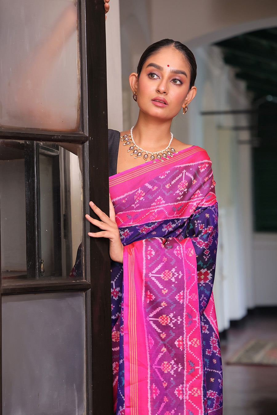 Exquisite Handloom Violet and Pink Mulberry Silk Ikat Patola Saree with Intricate Navratna Motif