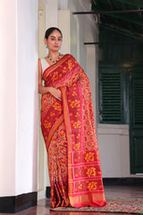 Elegant Handloom Peach and Red Mulberry Silk Ikat Patola Saree with Floral Motifs