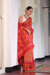 Elegant Handloom Peach and Red Mulberry Silk Ikat Patola Saree with Floral Motifs