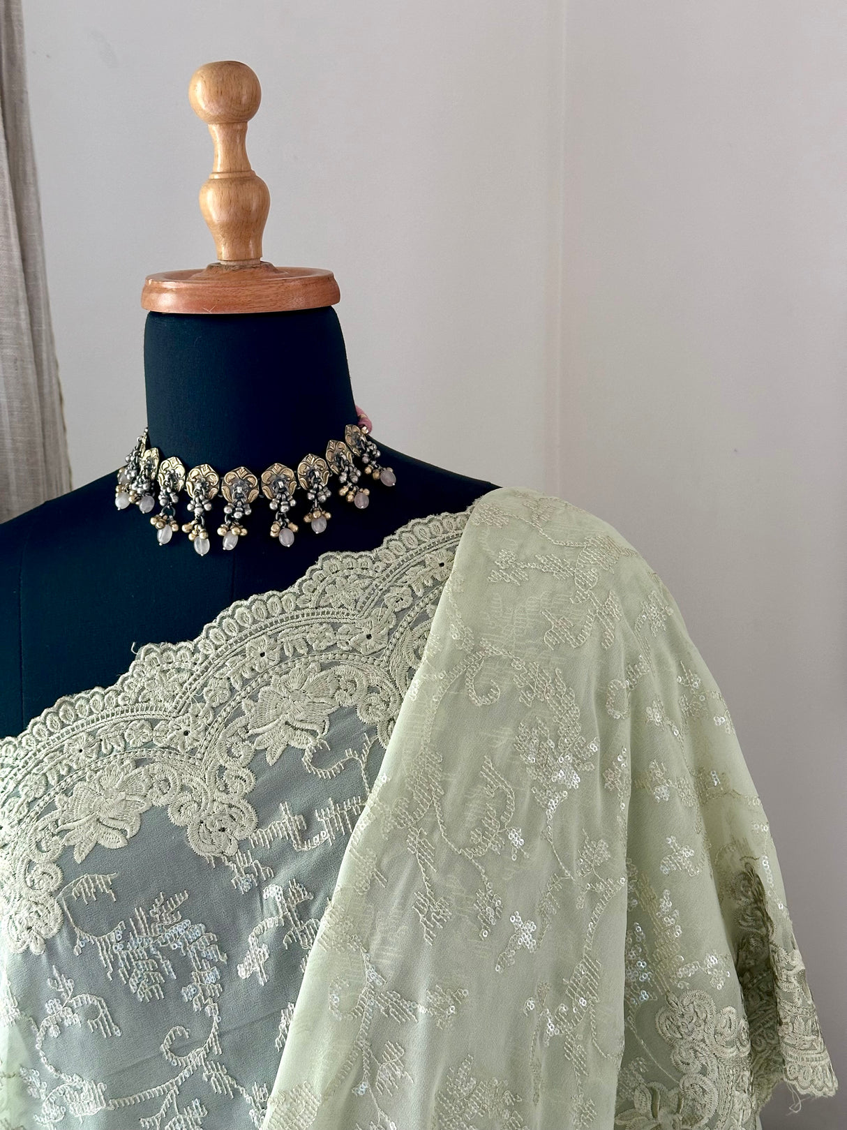 Georgette saree embellished with machine embroidery