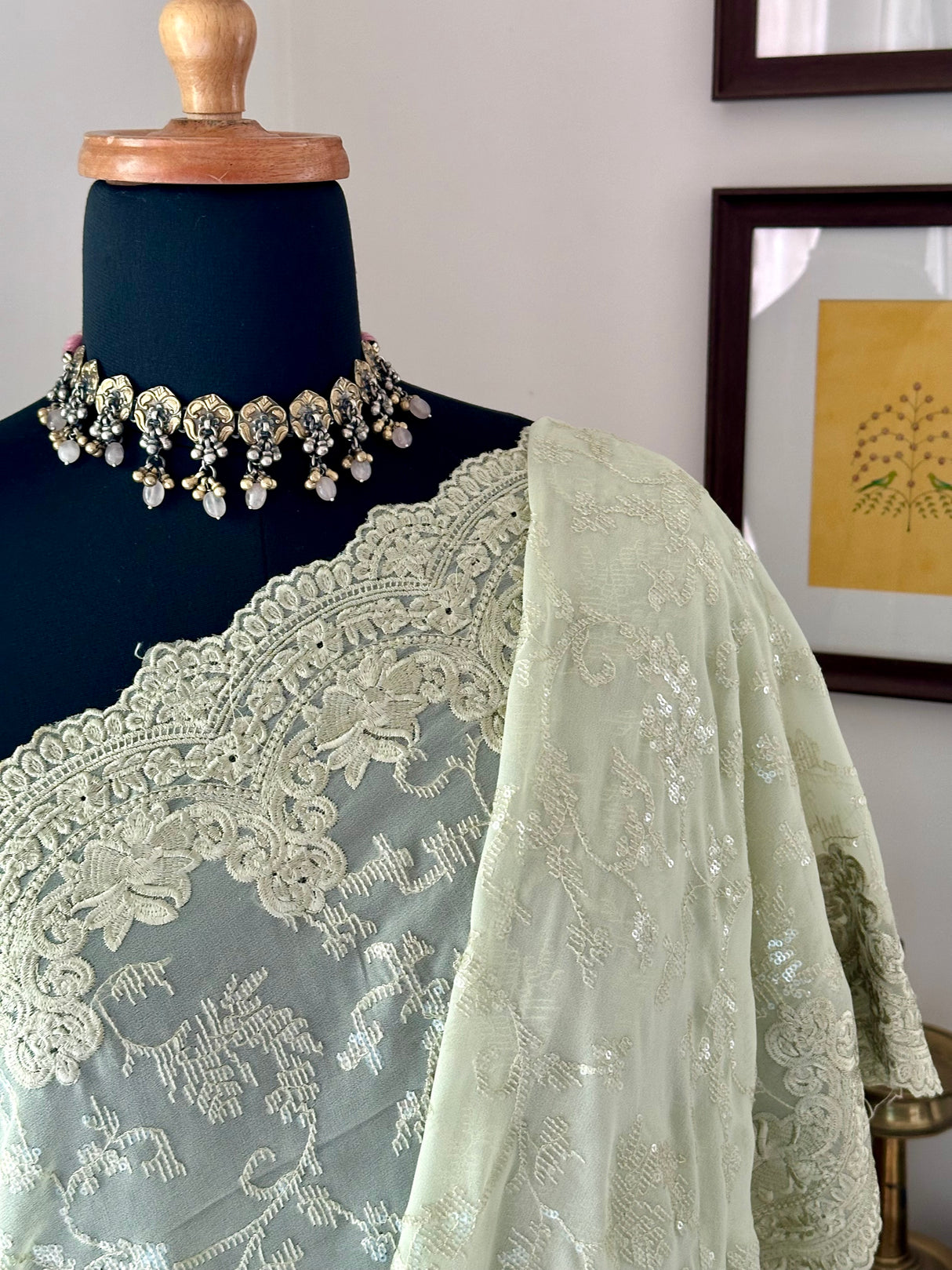 Georgette saree embellished with machine embroidery