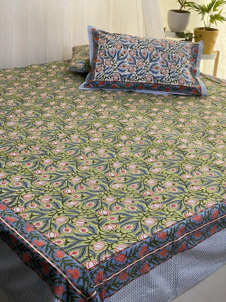 Green cotton bedsheet with traditional Jaipuri pomegranate motifs