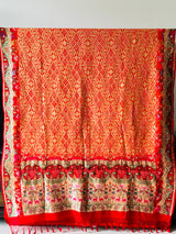 Vibrant Orange and Red Handloom Pure Banarsi Georgette Bandhani Saree