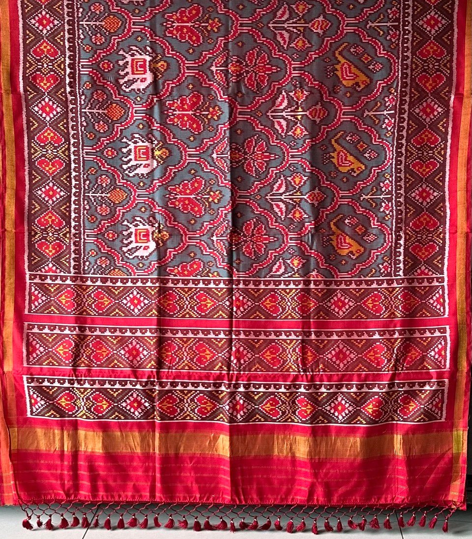 Distinct Handloom Teal and Red Mulberry Silk Ikat Patola Saree with Flora and Fauna