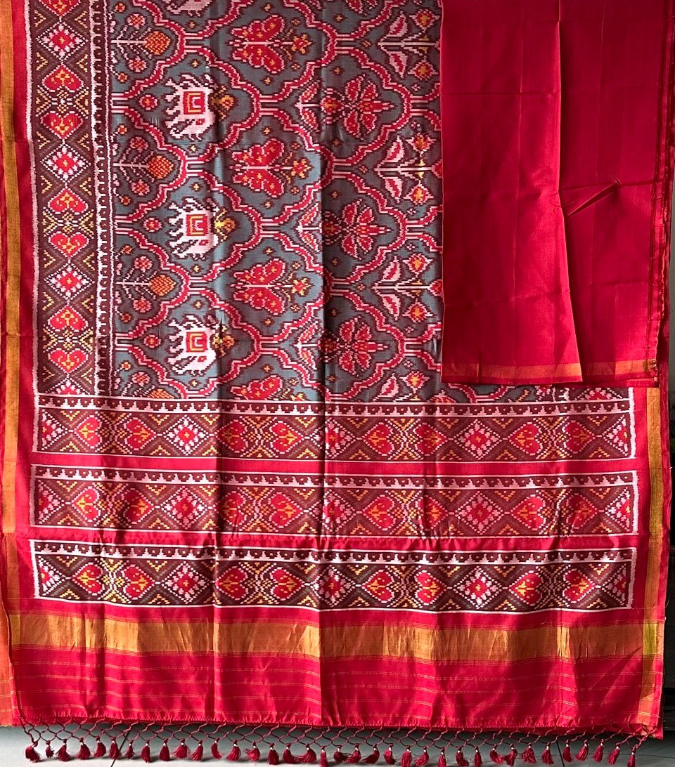 Distinct Handloom Teal and Red Mulberry Silk Ikat Patola Saree with Flora and Fauna