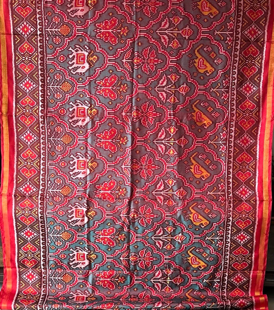 Distinct Handloom Teal and Red Mulberry Silk Ikat Patola Saree with Flora and Fauna