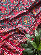 Distinct Handloom Teal and Red Mulberry Silk Ikat Patola Saree with Flora and Fauna