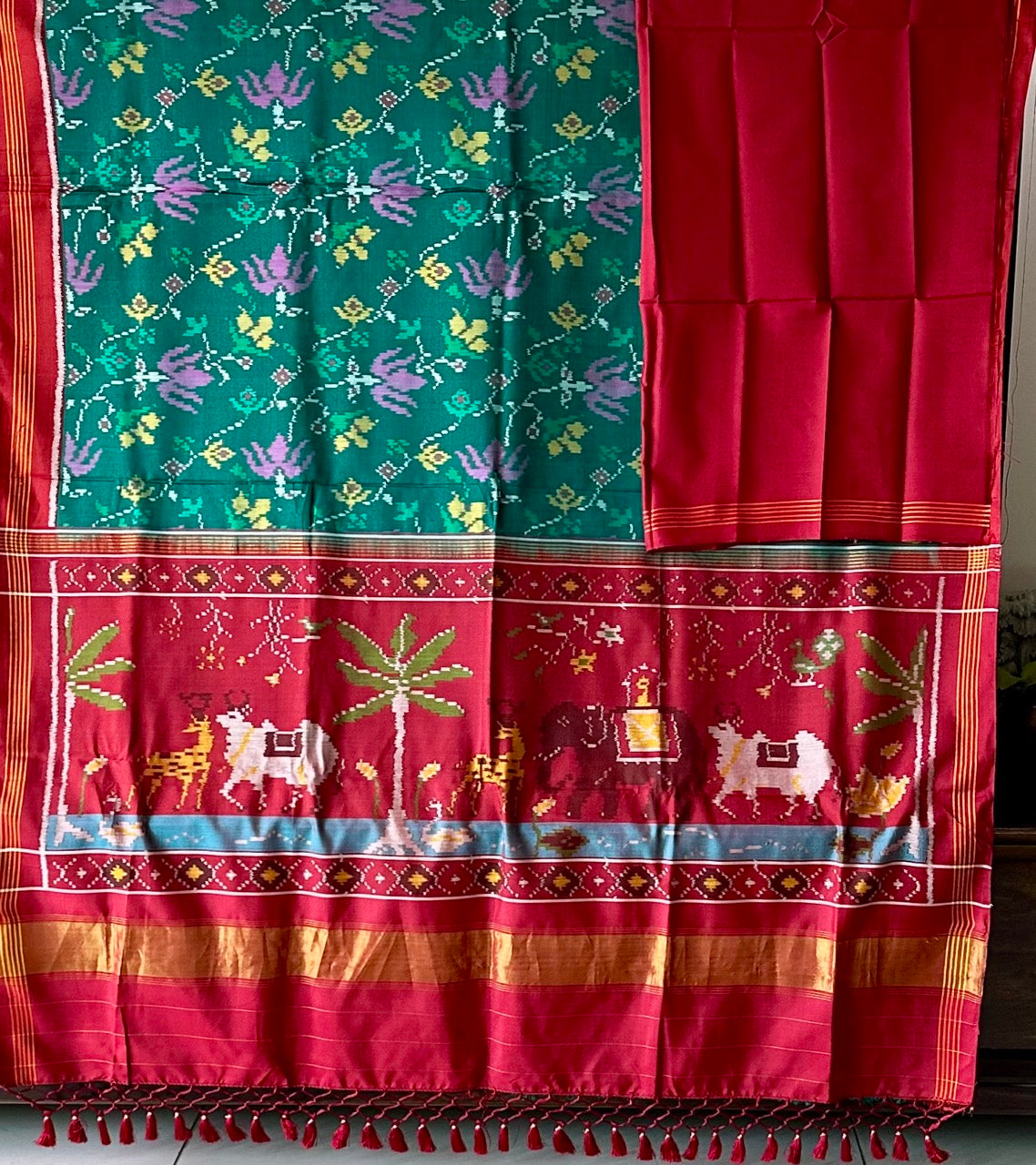 Evergreen Handloom Teal and Pink Mulberry Silk Ikat Patola Saree with Floral and Animal Motif