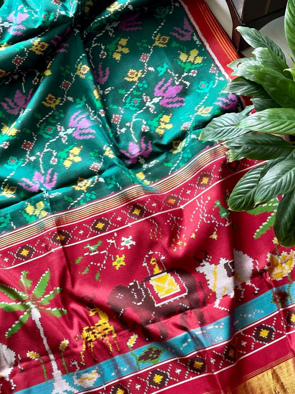 Evergreen Handloom Teal and Pink Mulberry Silk Ikat Patola Saree with Floral and Animal Motif