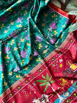 Evergreen Handloom Teal and Pink Mulberry Silk Ikat Patola Saree with Floral and Animal Motif