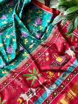 Evergreen Handloom Teal and Pink Mulberry Silk Ikat Patola Saree with Floral and Animal Motif