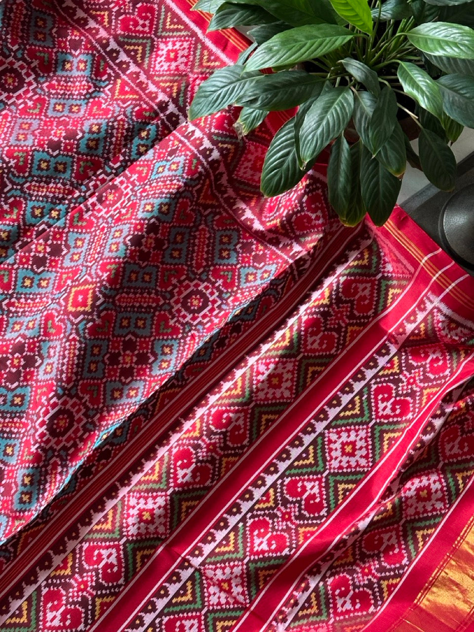 Elegant Handloom Teal and Red Mulberry Silk Ikat Patola Saree with Pan Bhat Motifs