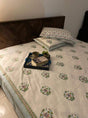 Pink and green percale cotton bedsheet in flat and elastic fitted styles