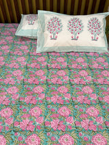 Pink and green printed bedsheet for wedding favours