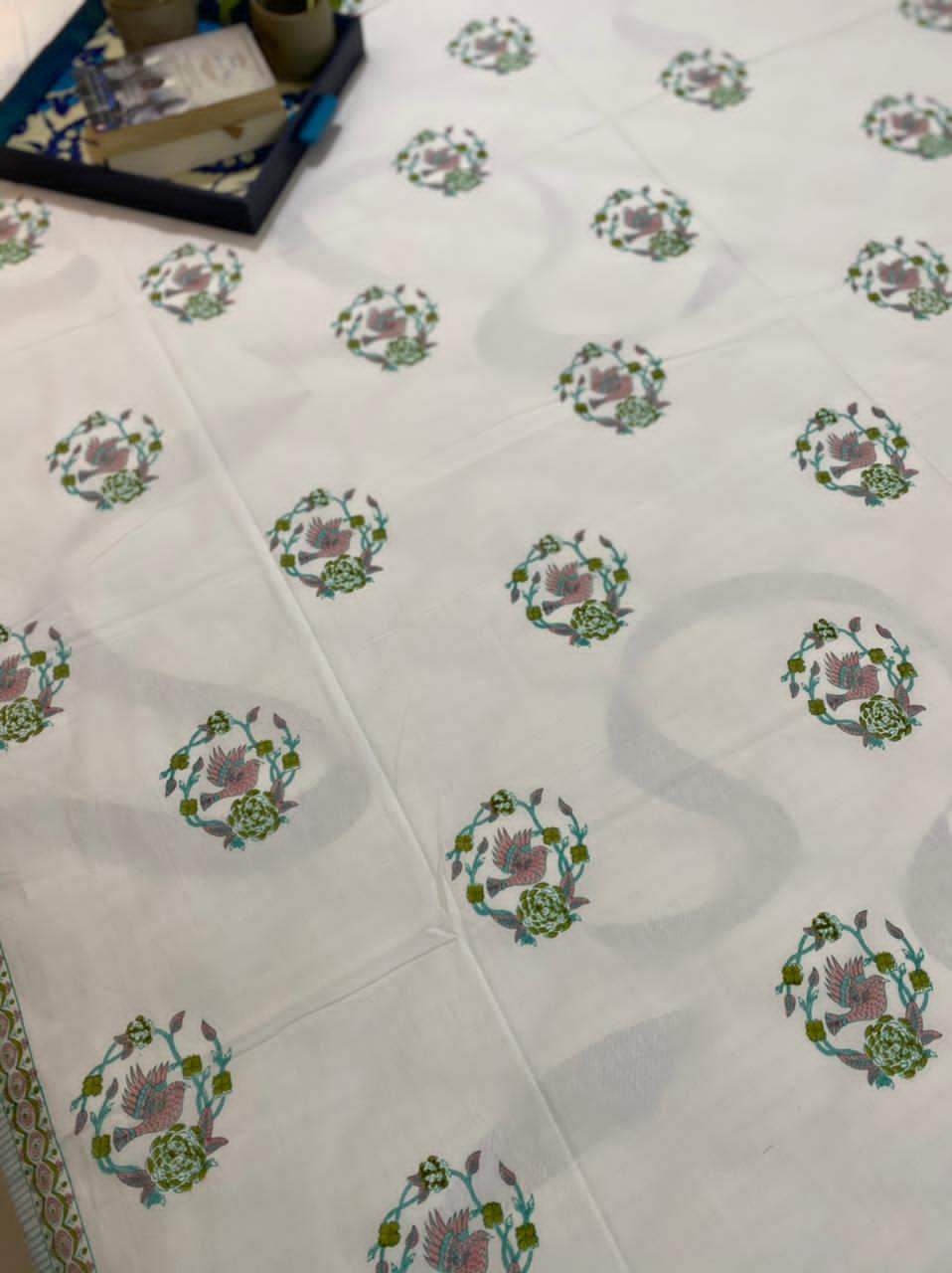 Pink cotton bedsheet with parrot in cage print and lattice detailing