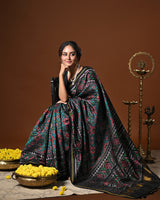 Stylish Handloom Teal and Black Mulberry Silk Ikat Patola Saree with Intricate Navratna Motif