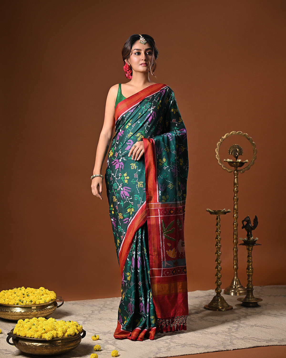 Evergreen Handloom Teal and Pink Mulberry Silk Ikat Patola Saree with Floral and Animal Motif