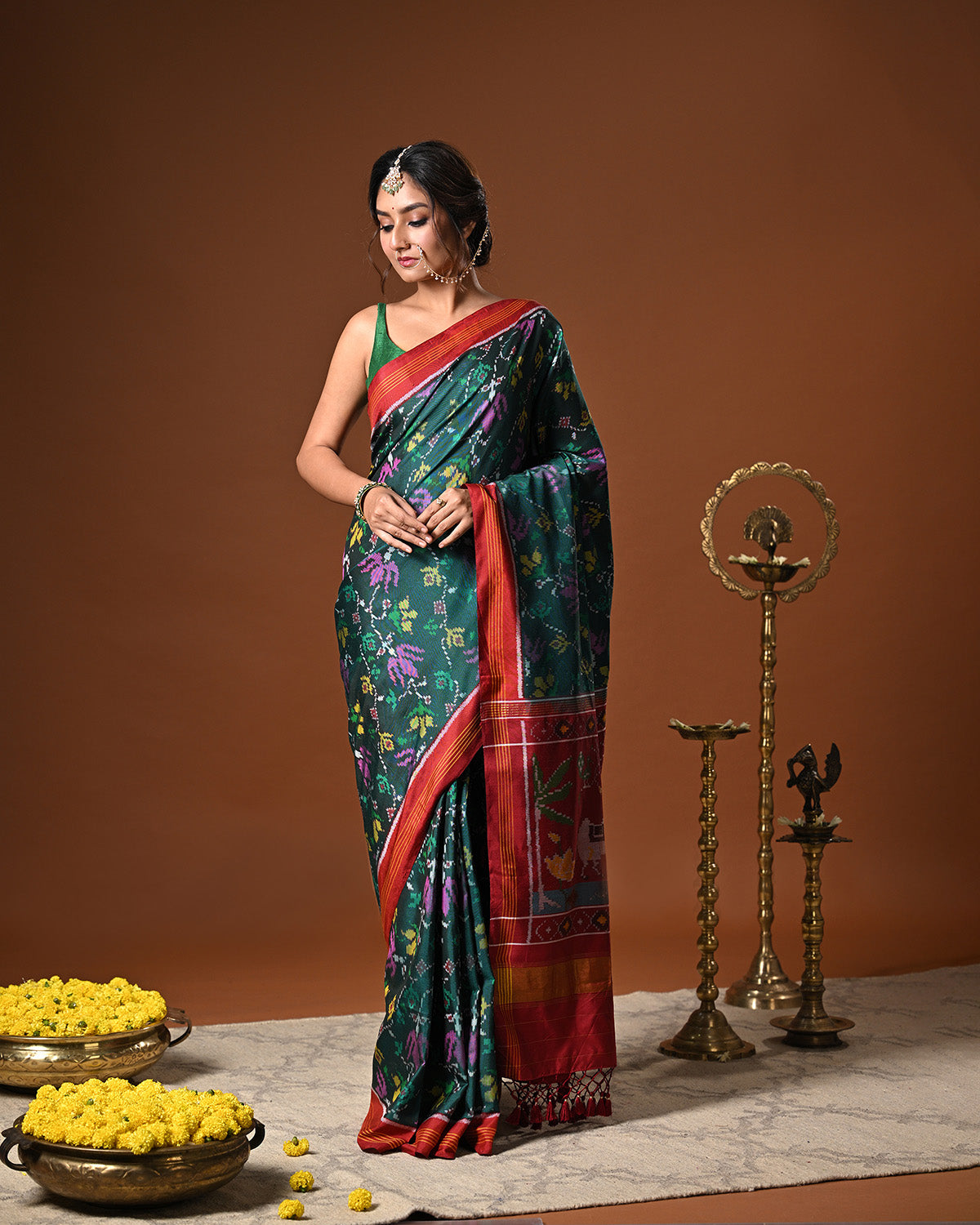 Evergreen Handloom Teal and Pink Mulberry Silk Ikat Patola Saree with Floral and Animal Motif