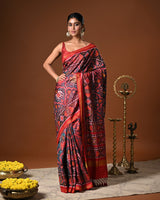 Distinct Handloom Teal and Red Mulberry Silk Ikat Patola Saree with Flora and Fauna