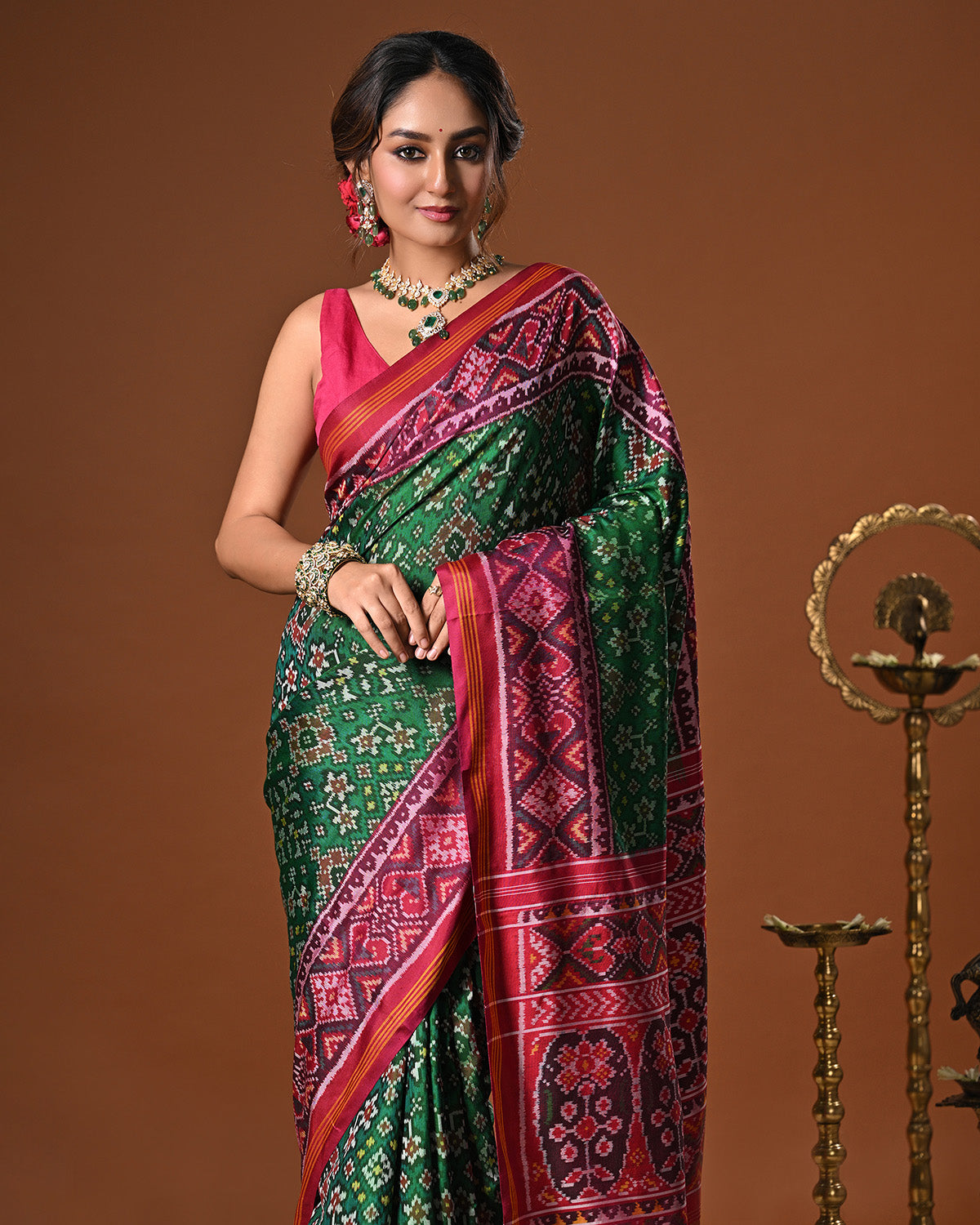 Timeless Handloom Green and Pink Mulberry Silk Ikat Patola Saree with Intricate Navratna Motif