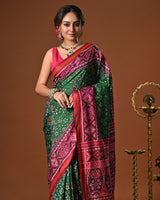 Timeless Handloom Green and Pink Mulberry Silk Ikat Patola Saree with Intricate Navratna Motif