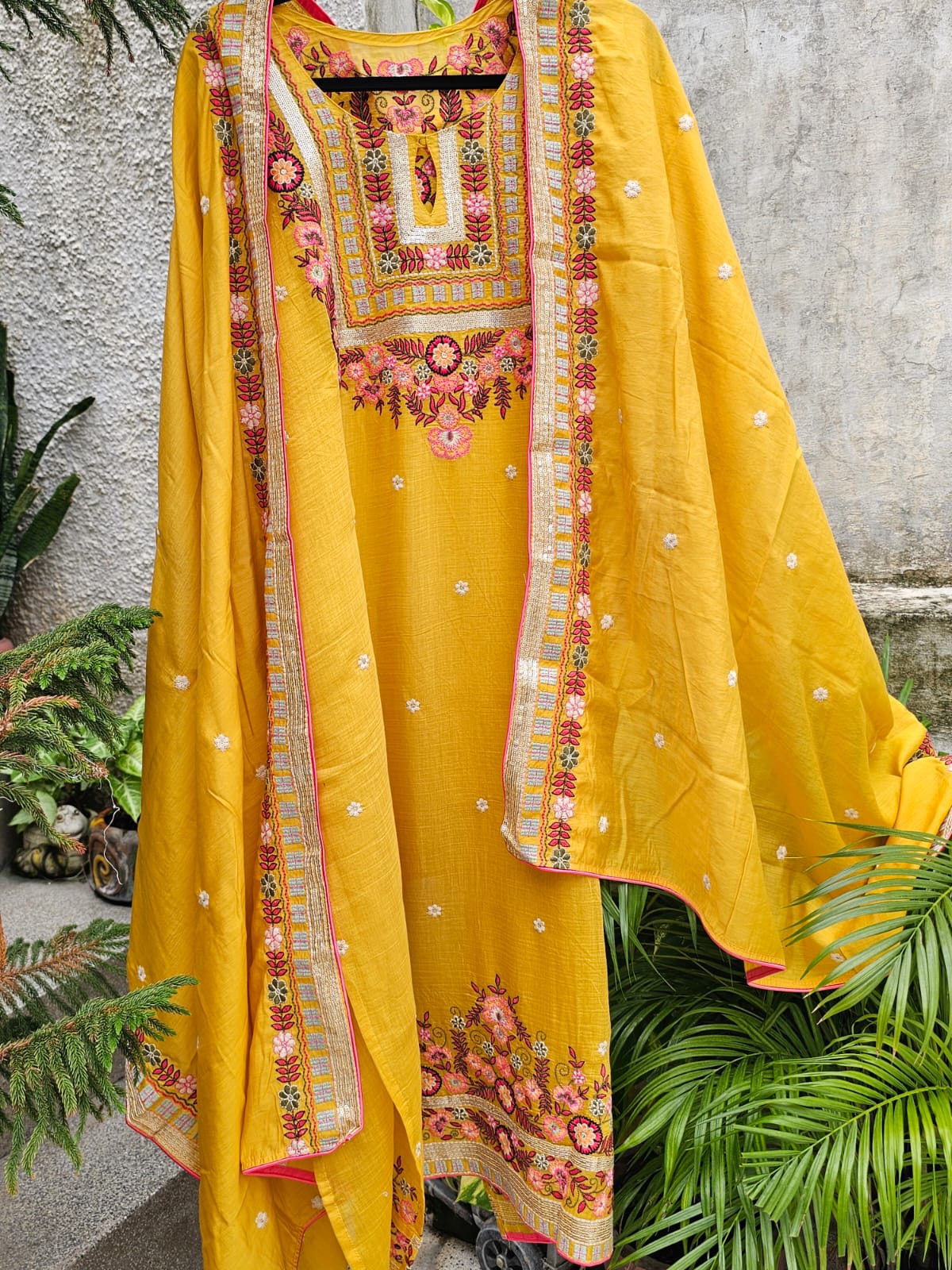 The festive Chanderi Mulmul 3 Piece Semi Stitched Suit Set in Yellow Colour