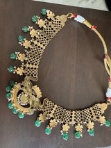 Katha of Jewels antique finish 92.5 sterling silver temple necklace set with peacock motif, green aventurine beads, and matching jhumka earrings