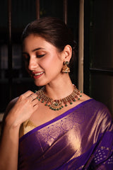 Katha of Jewels antique finish 92.5 sterling silver temple necklace set with peacock motif, green aventurine beads, and matching jhumka earrings