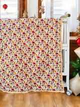 reversible dual print jungle baby quilt with cute elephant jungle family on front and cheerful giraffe friends on reverse made in India for USA and Malaysia