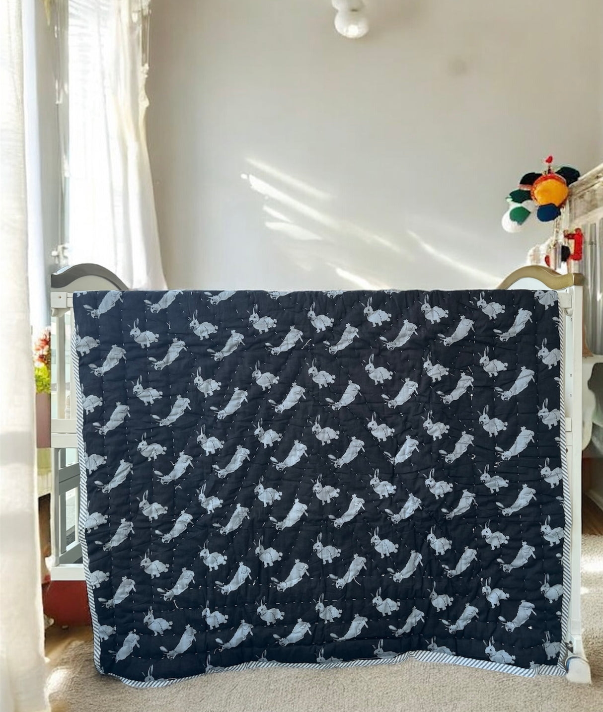 handcrafted reversible giraffe and rabbit theme baby dohar in neutral colors perfect for modern nurseries in Ireland and Dubai