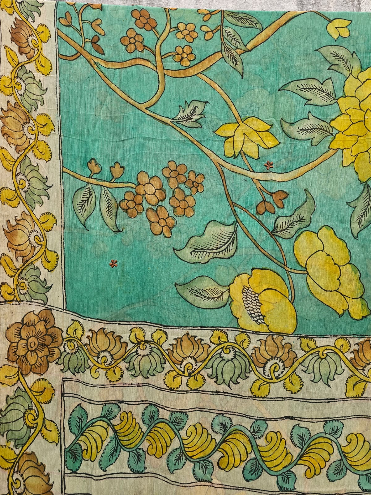 artistic-turquoise-flora-kalamkari-chiffon-saree