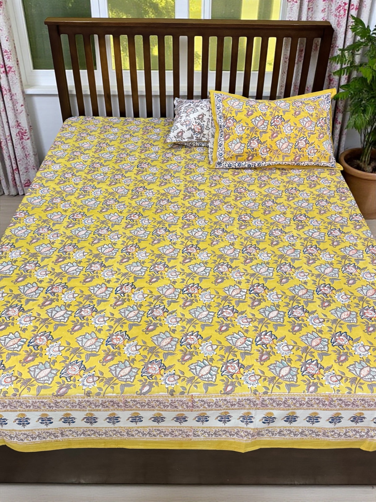 bedsheet-set-with-reversible-mulmul-quilt-floral