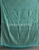 Shop pure Vasundhara silk Bandhani saree in sea green with gold zari checks & rich tissue pallu. Authentic handwoven luxury online at Kapaas Katha.