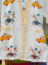 Detail shot of the hood of the cars theme kids bathrobe, featuring playful car motifs