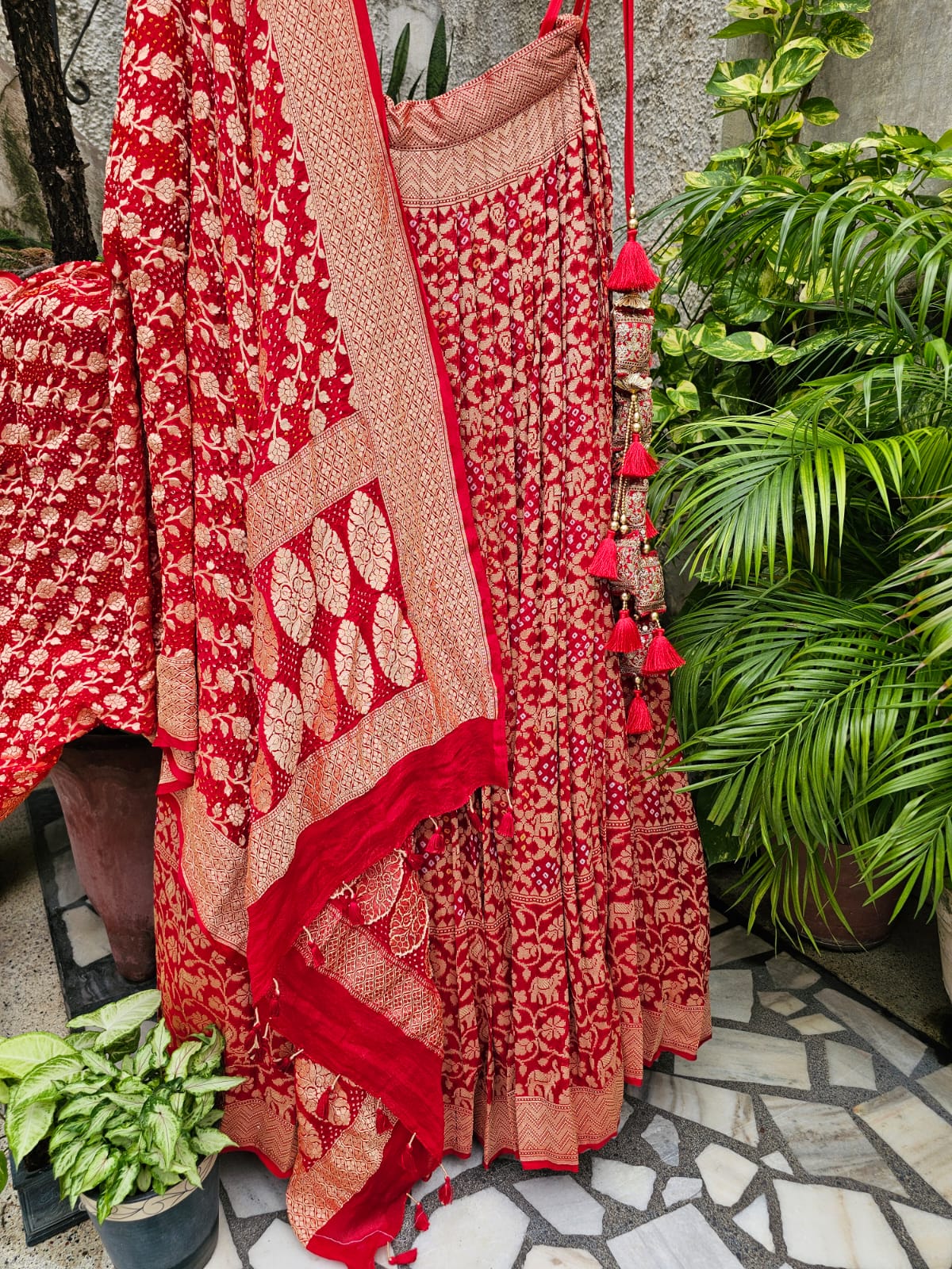 Mesmerizing Red Pure Banarsi Georgette Bandhani Lehenga