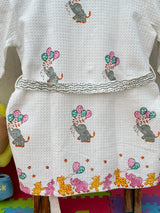 Elephant kids bathrobe displayed in a styled bathroom setting, creating a cozy atmosphere