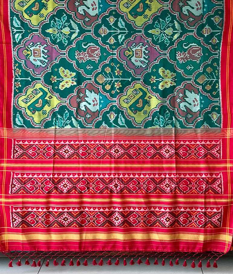 Exclusive Handloom Green and Red Mulberry Silk Ikat Patola Saree with Floral and Animal Motifs