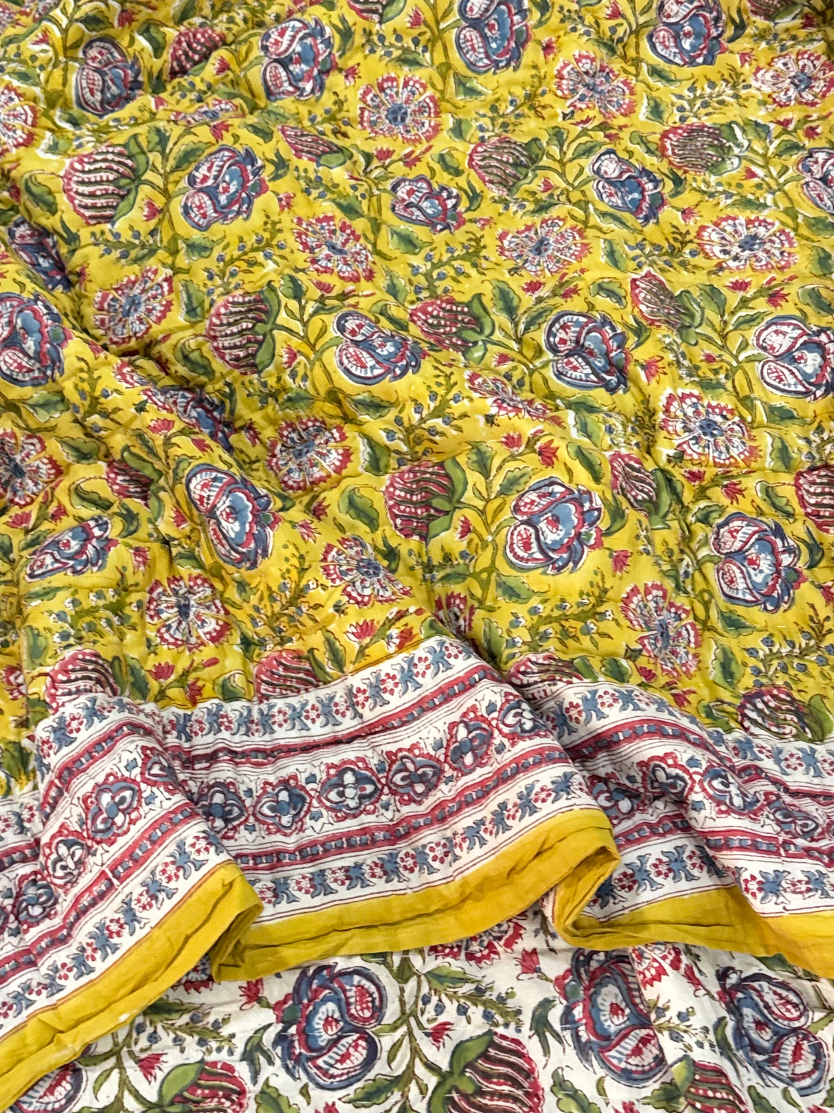 floral-patterned-fabric-with-yellow-background