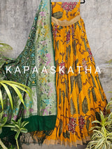 Colorful lehenga with floral patterns  featuring the brand 'Kapaaskatha'.