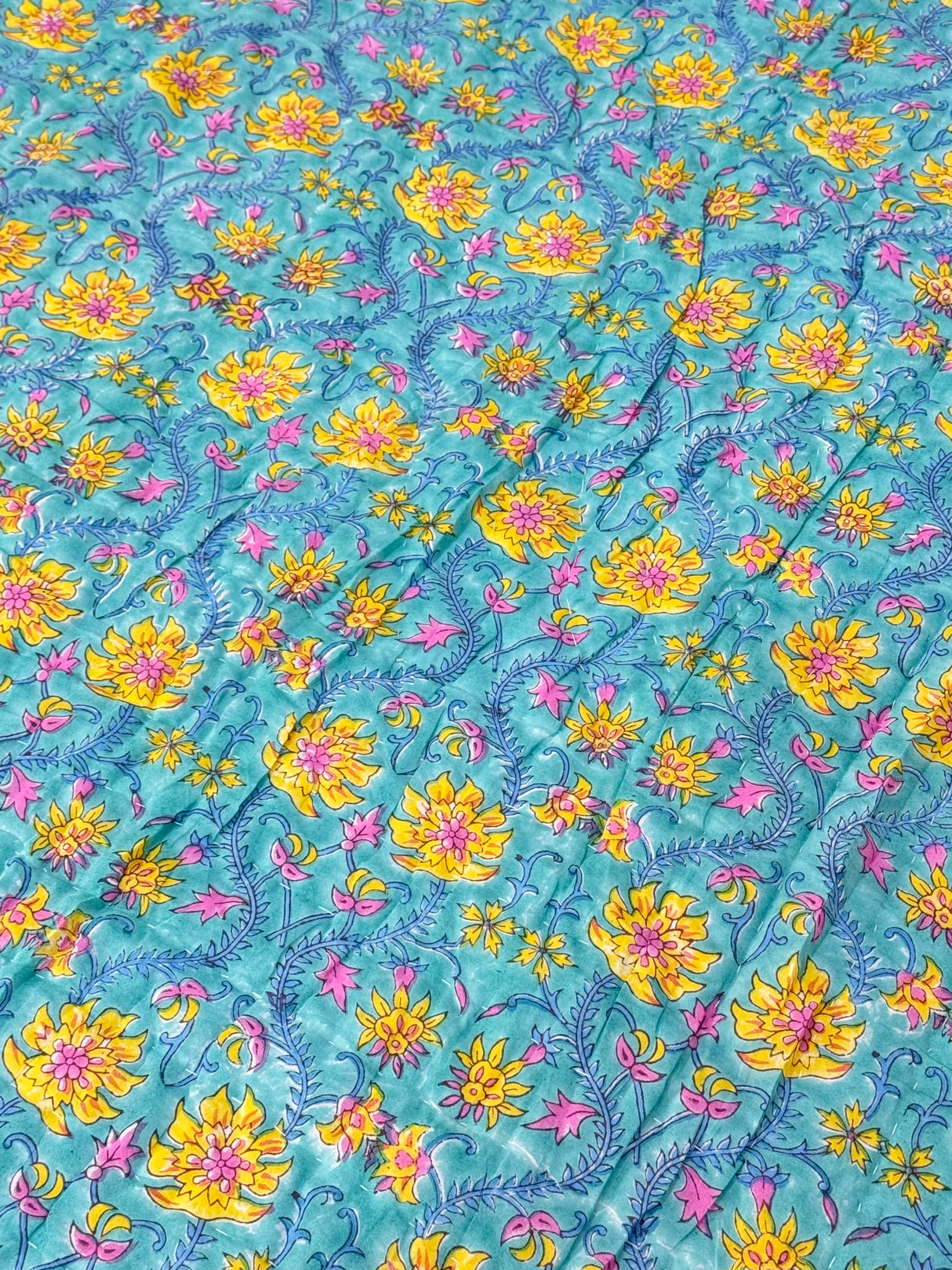 handblock-cotton-quilt-with-all-over-floral-pattern